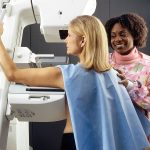 Woman receives mammogram